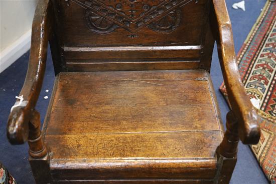 A mid 17th century jointed oak Wainscot elbow chair, W.1ft 9.5in. H.3ft.